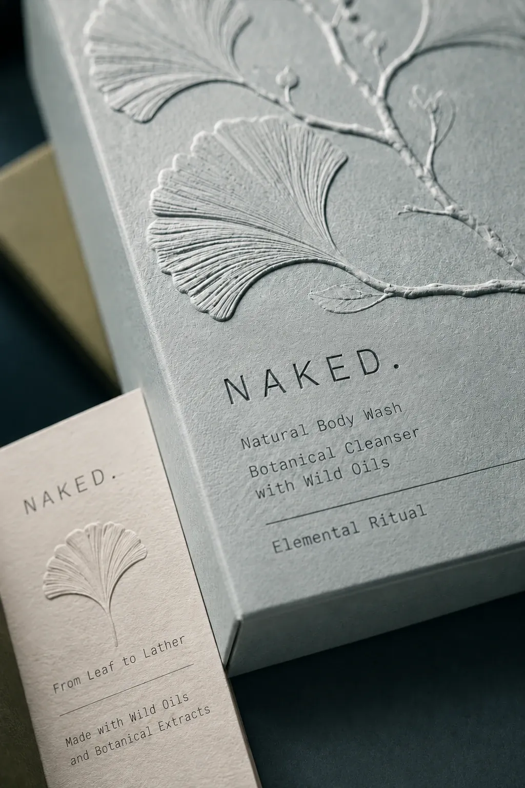 NAKED. embossed detail